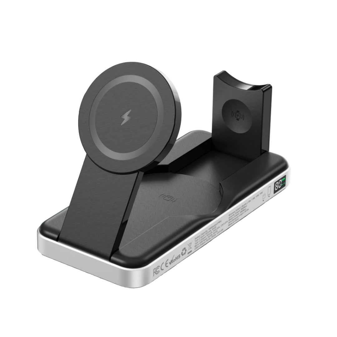 A black PowerBuddy 2 5 in 1 Wireless Powerbank by Urban with designated areas for a smartphone, smartwatch, and earbuds features MagSafe compatibility and a digital display on the front right side. Its ultra-portable design makes it an ideal charging device for users on the go.