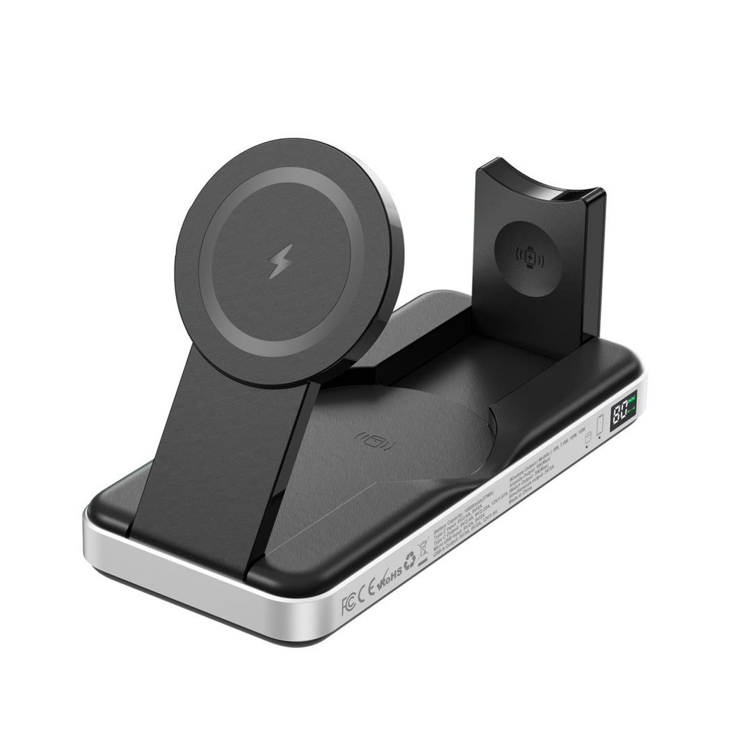 The Urban PowerBuddy 2.0 5-in-1 Wireless Powerbank is a sleek, black multi-device wireless charging station featuring an ultra portable design with two charging docks and one vertical charging pad on a silver base.